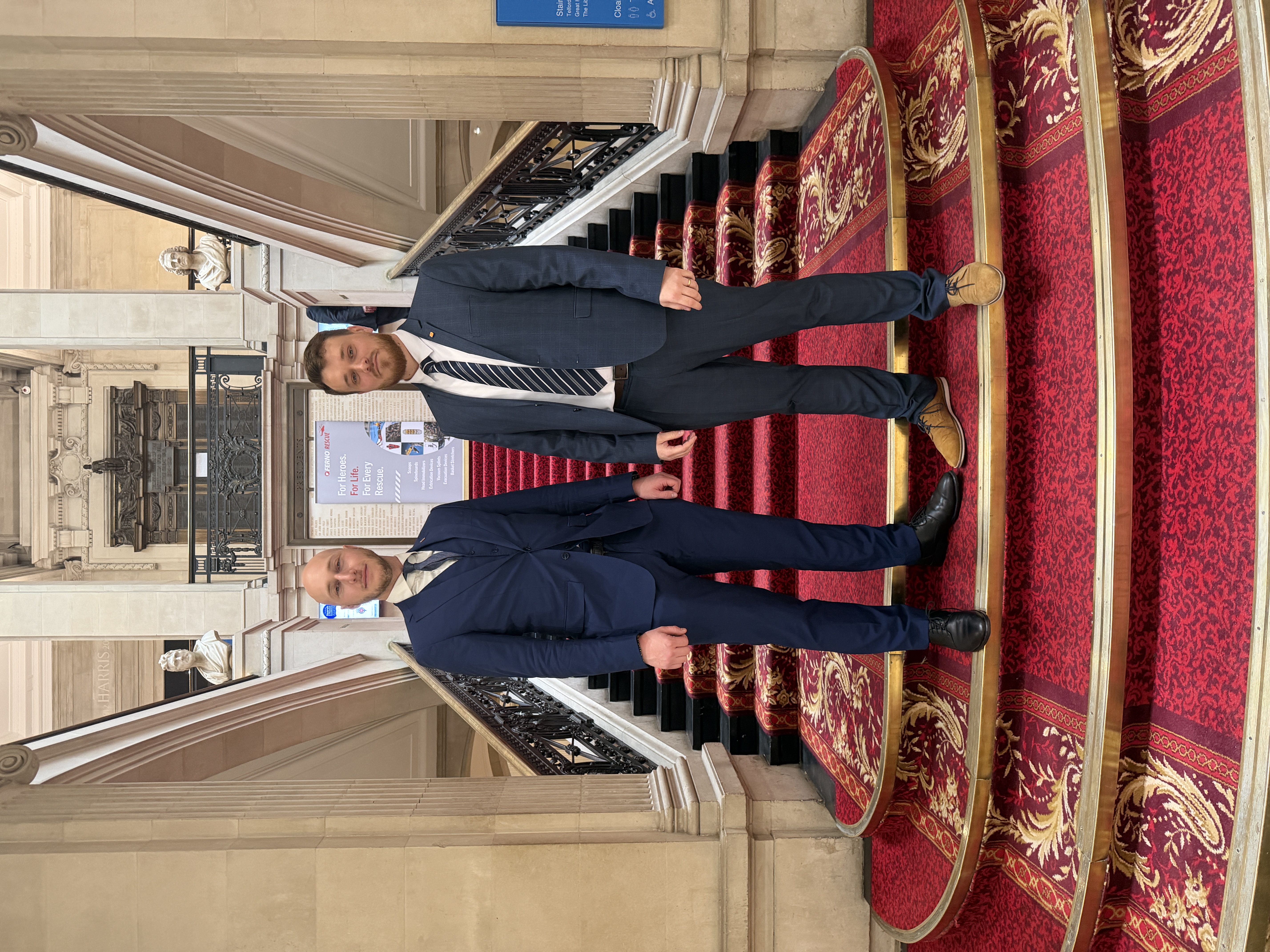 Global SAR Hub co-founder Tanguy Le Coq with partner Robin van Bruggen on the staircase of the Institution of Civil Engineers at the 2026 Global SAR Excellence Awards in London